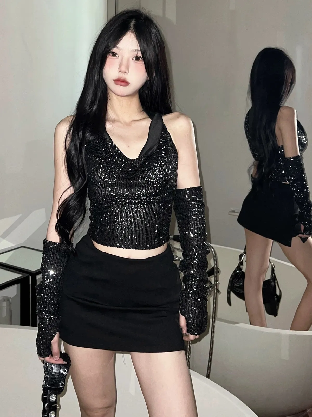 KLIOU is both A and sassy. Black sequined swing collar hooded vest with sleeves makes the street slim and stylish hot girl top.